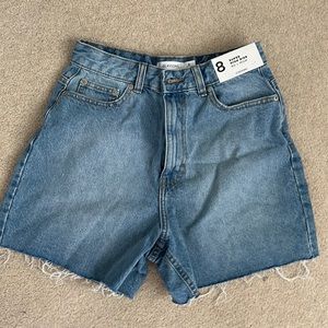 Mom jean shorts new with tags. Light wash blue. Not super short.